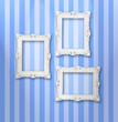 Set of white ornamental frames on a stripy wallpaper Set of white ornamental frames on a stripy wallpaper