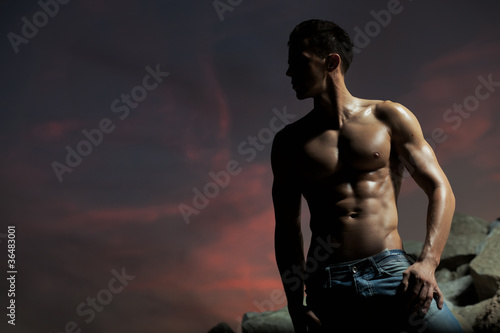 Photo: Muscular body of an handsome bodybuilder Muscular body of an handsome bodybuilder