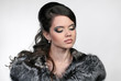 Attractive glamorous woman in fur coat