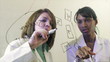 Video: Lab Techs Writing on Clear Board Lab Techs Writing on Clear Board