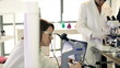 Video: CSI Team Looking at Evidence on Microscope CSI Team Looking at Evidence on Microscope