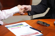 Business man and business woman making a deal