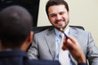Two businesspartners having a conversation and laughing
