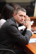 Serious mature businessman in business meeting at office