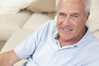 Photo: Happy Handsome Senior Man Smiling at Home Happy Handsome Senior Man Smiling at Home