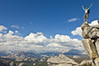 Photo: Rock climber celebrates on the summit. Rock climber celebrates on the summit.