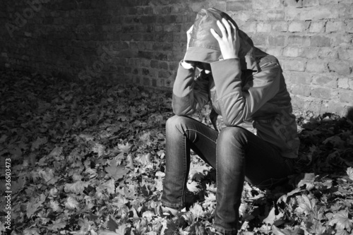 Photo: depressed teenager facing her own problems. depressed teenager facing her own problems.