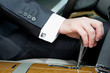 Hand of the driver of the car