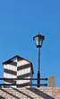 Old-fashioned sentry box and street lamp