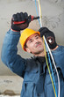 Electrician at wiring work