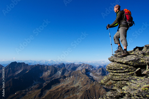 Photo: Young man trekking in the mountains Young man trekking in the mountains