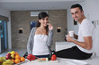 young couple have fun in modern kitchen