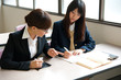 asian teacher and student in the classroom
