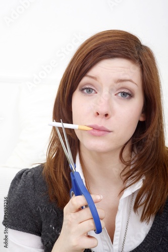 Photo: good intent: woman with cigarette and scissors good intent: woman with cigarette and scissors