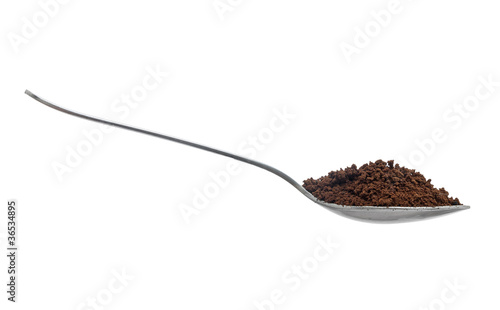 Photo: Spoonful of instant coffee granules, isolated over white Spoonful of instant coffee granules, isolated over white