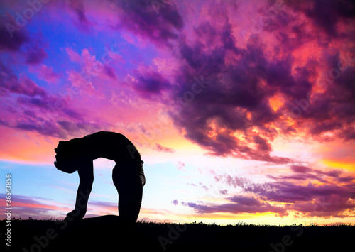 Photo: Yoga silhouette camel pose Yoga silhouette camel pose