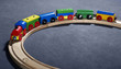 colorful wooden toy train on tracks