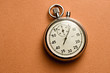 Stopwatch isolated on the paper background