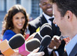 Politician speaking to reporters