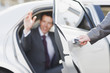 Politician emerging from limo
