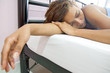 Young beautiful woman sleeping in bed