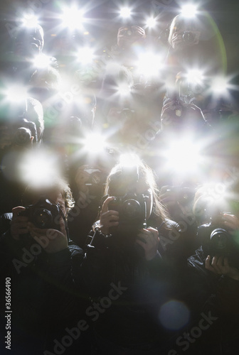 Photo: Paparazzi taking pictures with flash Paparazzi taking pictures with flash