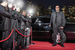 Photo : Bodyguard opening limo door on red carpet Bodyguard opening limo door on red carpet