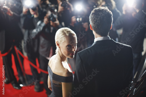 Foto: Celebrities posing for paparazzi on red carpet Celebrities posing for paparazzi on red carpet