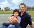 Photo en ligne au meilleur prix Family Basketball Grandfather and Grandson in the Park