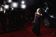 Photo : Celebrity posing for paparazzi on red carpet Celebrity posing for paparazzi on red carpet