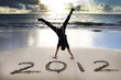 happy new year 2012 on the beach with sunrise happy new year 2012 on the beach with sunrise