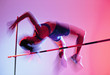 Athlete curling over high jump