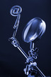 magnifying glass & internet symbol