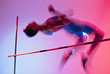 Athlete curling over high jump