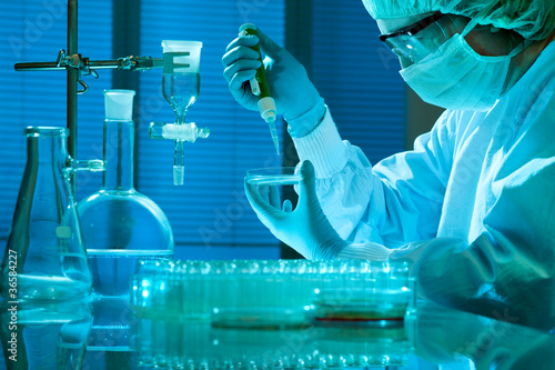 Photo: scientist working at the laboratory scientist working at the laboratory