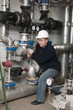 employee tightens the screw