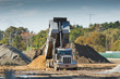 Dump truck dumbing dirt
