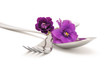 Spoon and fork with violets