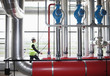 Businessman walking in factory