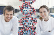 Scientists with molecular model in lab