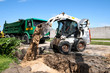 Mini excavator at construction site