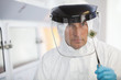 Scientist examining microchip in lab