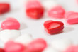 Heart shaped candy amongst others Heart shaped candy amongst others
