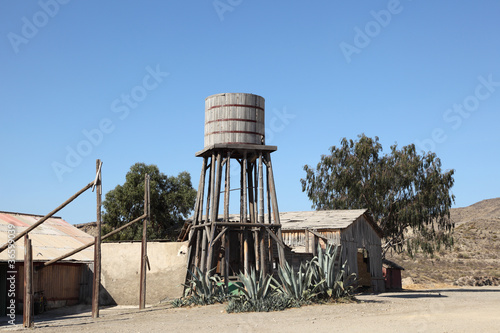 Photo: Old wooden water tower in a country park Old wooden water tower in a country park