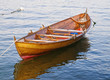 The wooden rowing and sailing boat The wooden rowing and sailing boat