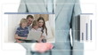 Businessman dragging videos about families using a laptop