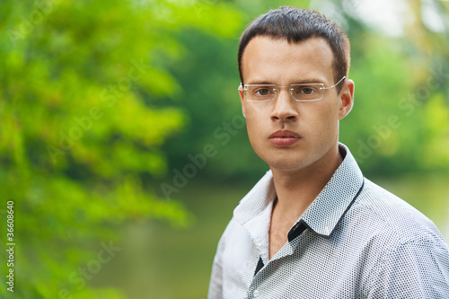 Photo: Portrait young man glasses Portrait young man glasses