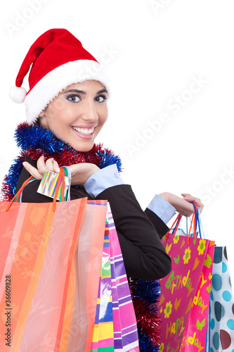 Photo: santa girl with shopping bags santa girl with shopping bags