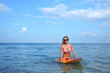 Sexy surf girl on the beach