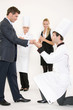 Restaurant manager with  his staff